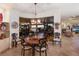Elegant dining room with a view, featuring stylish chairs and unique light fixtures at 801 3Rd E St, Palmetto, FL 34221