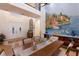 Dining room features a mural, a double door entry, and stylish decor at 801 3Rd E St, Palmetto, FL 34221