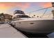 Large yacht on a private dock near the shore of a luxury home at 801 3Rd E St, Palmetto, FL 34221