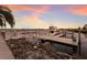 Dock with a boat slip provides easy access to the water, enhancing this waterfront property at 801 3Rd E St, Palmetto, FL 34221