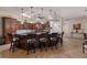 Spacious kitchen with a large island, dark wood cabinetry, and pendant lighting at 801 3Rd E St, Palmetto, FL 34221