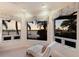 Bright sitting area featuring large windows with waterfront views and a comfortable chaise lounge at 801 3Rd E St, Palmetto, FL 34221