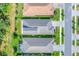 Aerial view showcasing the home's roof, landscaping, and location in a residential neighborhood at 8069 Tidal Pointe Way, Sarasota, FL 34240