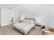 Bright bedroom with a large window and hardwood floors at 8069 Tidal Pointe Way, Sarasota, FL 34240