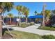 A pickleball court with a covered seating area, inviting residents to enjoy the community's recreational amenities at 8069 Tidal Pointe Way, Sarasota, FL 34240
