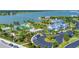 A scenic aerial view of the clubhouse, pool, and lake showcasing the community's amenities at 8069 Tidal Pointe Way, Sarasota, FL 34240