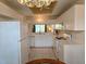 Bright kitchen with tile floors, modern appliances, and a window view at 8755 Olde Hickory Ave # 7107, Sarasota, FL 34238