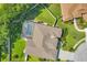 Aerial view of backyard featuring a screened pool and manicured landscaping at 9016 30Th E St, Parrish, FL 34219
