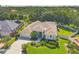 Beautifully landscaped front yard with an aerial view of the property at 9016 30Th E St, Parrish, FL 34219