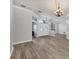 Open foyer with wood floors and a decorative glass front door offers an inviting entrance at 9016 30Th E St, Parrish, FL 34219