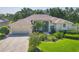 Well-manicured front yard featuring mature landscaping at 9016 30Th E St, Parrish, FL 34219