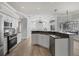 Bright kitchen with white cabinets, granite countertops and stainless steel appliances at 9016 30Th E St, Parrish, FL 34219