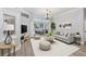 Bright living room with sliding doors to an outdoor living space and modern decor at 9016 30Th E St, Parrish, FL 34219