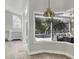 A sunny view from inside the house looking out to a screened pool and patio at 9016 30Th E St, Parrish, FL 34219