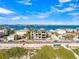 Beautiful aerial view of a house with views of the Gulf and coastline at 100 6Th S St, Bradenton Beach, FL 34217