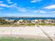Aerial view of a modern home near the beach with amazing Gulf views at 100 6Th S St, Bradenton Beach, FL 34217