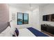 Comfortable bedroom featuring ocean view, a flat-screen TV, and tasteful contemporary decor at 100 6Th S St, Bradenton Beach, FL 34217