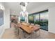 Elegant dining room with ocean views, modern lighting, and stylish decor, perfect for entertaining at 100 6Th S St, Bradenton Beach, FL 34217