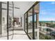 Hallway view leads to a dining area and balcony overlooking the ocean at 100 6Th S St, Bradenton Beach, FL 34217
