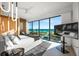 Bright main bedroom features ocean views, a modern platform bed, and sleek lighting at 100 6Th S St, Bradenton Beach, FL 34217