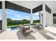 Inviting patio area with modern furniture, perfect for outdoor lounging at 100 6Th S St, Bradenton Beach, FL 34217