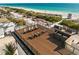 Spacious rooftop terrace featuring comfortable seating and a grill, perfect for enjoying the ocean view at 100 6Th S St, Bradenton Beach, FL 34217