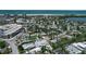 Beautiful aerial view showing the property's location relative to the beach, cityscape, and surrounding tropical landscape at 130 N Adams Dr, Sarasota, FL 34236