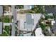 Aerial view of the home showing roof and yard size in relation to surrounding neighborhood at 130 N Adams Dr, Sarasota, FL 34236