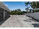 Spacious backyard with plenty of area and lush greenery creating a private outdoor oasis at 130 N Adams Dr, Sarasota, FL 34236