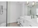 This bathroom features updated vanity with vessel sink and open shower at 130 N Adams Dr, Sarasota, FL 34236