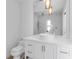 Modern bathroom with vanity, a sleek vessel sink and ample natural light at 130 N Adams Dr, Sarasota, FL 34236