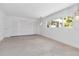Spacious bedroom featuring natural light, closet, and ample space at 130 N Adams Dr, Sarasota, FL 34236
