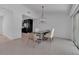 Dining room featuring modern lighting and access to the kitchen at 130 N Adams Dr, Sarasota, FL 34236