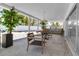 Enclosed patio area with seating and an outdoor kitchen, great for entertaining at 130 N Adams Dr, Sarasota, FL 34236