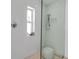 The shower showcases a modern design with a tiled wall and stone stool at 130 N Adams Dr, Sarasota, FL 34236