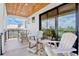Expansive balcony with outdoor seating, showcasing views, perfect for relaxing and enjoying the scenery at 135 Avenida Veneccia, Sarasota, FL 34242