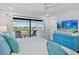 Charming bedroom with balcony, offering bright views and comfortable furnishings at 135 Avenida Veneccia, Sarasota, FL 34242