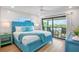 Cozy bedroom with balcony access, offering pleasant outdoor views and natural light at 135 Avenida Veneccia, Sarasota, FL 34242