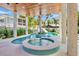 Lush pool area with spa and water features, perfect for relaxation at 135 Avenida Veneccia, Sarasota, FL 34242