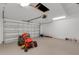 Attached garage with lawn equipment and ample space at 1370 Mccrory St, North Port, FL 34286