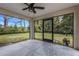 Spacious screened lanai featuring a concrete floor and views of the backyard at 1370 Mccrory St, North Port, FL 34286