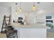 Bright kitchen with stainless steel appliances and a breakfast bar at 1516 Red Oak Ln, Port Charlotte, FL 33948