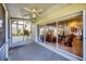 Enclosed lanai with sliding glass doors lead to an indoor living space at 1516 Red Oak Ln, Port Charlotte, FL 33948