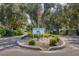 Community entrance sign for Heritage Oak Park at 1516 Red Oak Ln, Port Charlotte, FL 33948