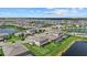 Community aerial shot reveals homes and ponds nestled in a well-planned suburban community at 15315 Golden Beam Pl, Bradenton, FL 34211
