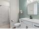 Stylish bathroom featuring walk-in shower, modern vanity, and decorative wall accents at 15315 Golden Beam Pl, Bradenton, FL 34211