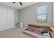 ' bedroom with neutral-toned walls, hardwood floors, and a built-in bed at 15315 Golden Beam Pl, Bradenton, FL 34211