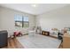 Bright playroom featuring hardwood floors, a large window, and ' furniture at 15315 Golden Beam Pl, Bradenton, FL 34211