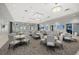 Spacious dining area with modern tables and chairs provides a great setting for community gatherings and events at 15315 Golden Beam Pl, Bradenton, FL 34211