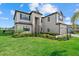 Beautiful two-story home features a manicured lawn and attractive landscaping at 15315 Golden Beam Pl, Bradenton, FL 34211